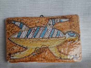 Mattone in ceramica dipinto