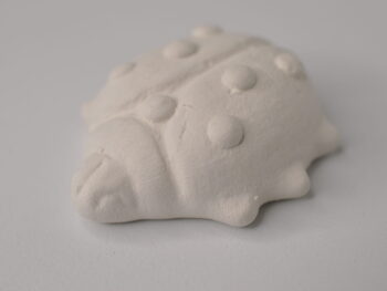 Coccinella in terracotta bianca